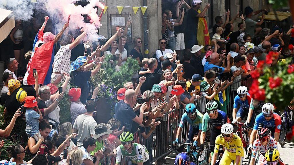 Fans watch stage 13 of the Tour de France