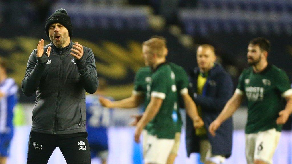 Derby County boss Paul Warne celebrates a win on the pitch