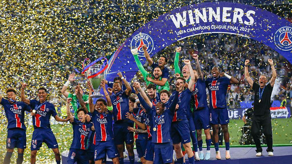 Paris St-Germain holding aloft the Champions League trophy