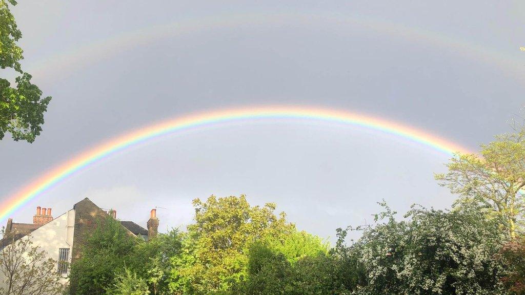 A rainbow over houses in London