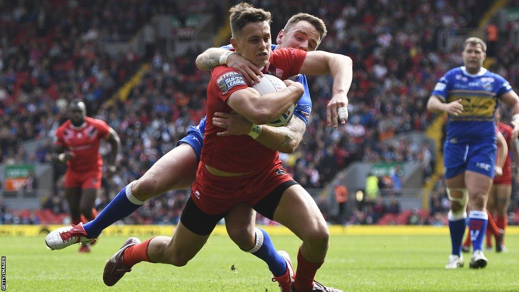 London Broncos' Alex Walker runs with the ball