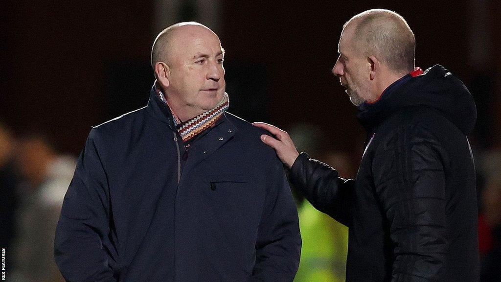 Accrington Stanley manager John Coleman (left) and assistant Jimmy Bell