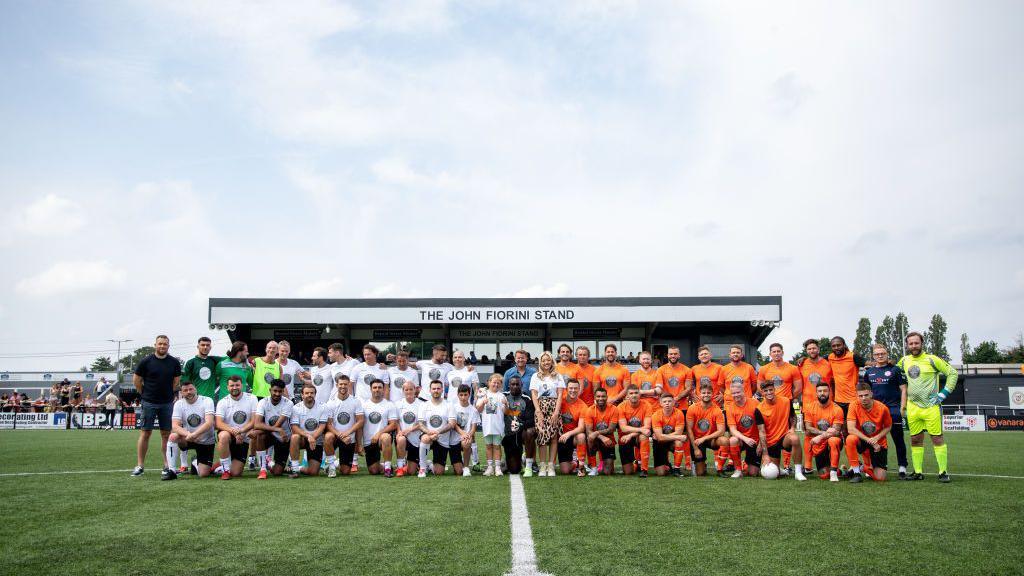 Players in front of the John Fiorini Stand ahead of the 2023 charity match