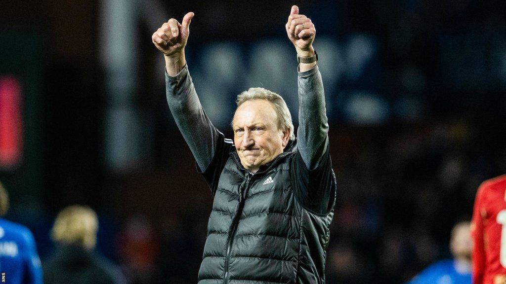 Neil Warnock gives the thumbs up to the Aberdeen fans