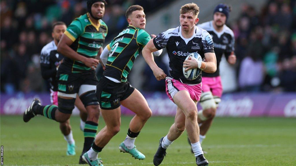 Louie Johnson runs with the ball for Newcastle Falcons against Northampton Saints