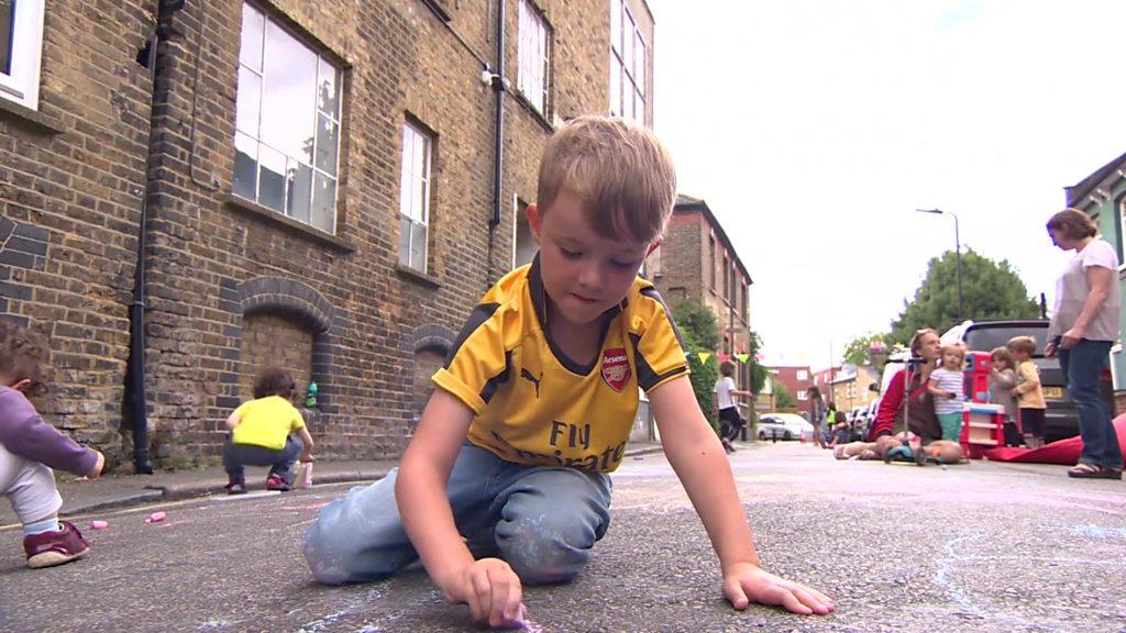 Boy playing in the street