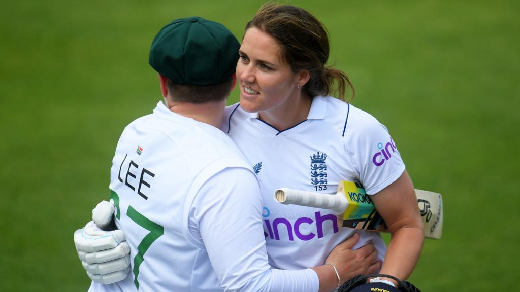 South Africa's Lizelle Lee (left) and England's Nat Sciver (right) embrace