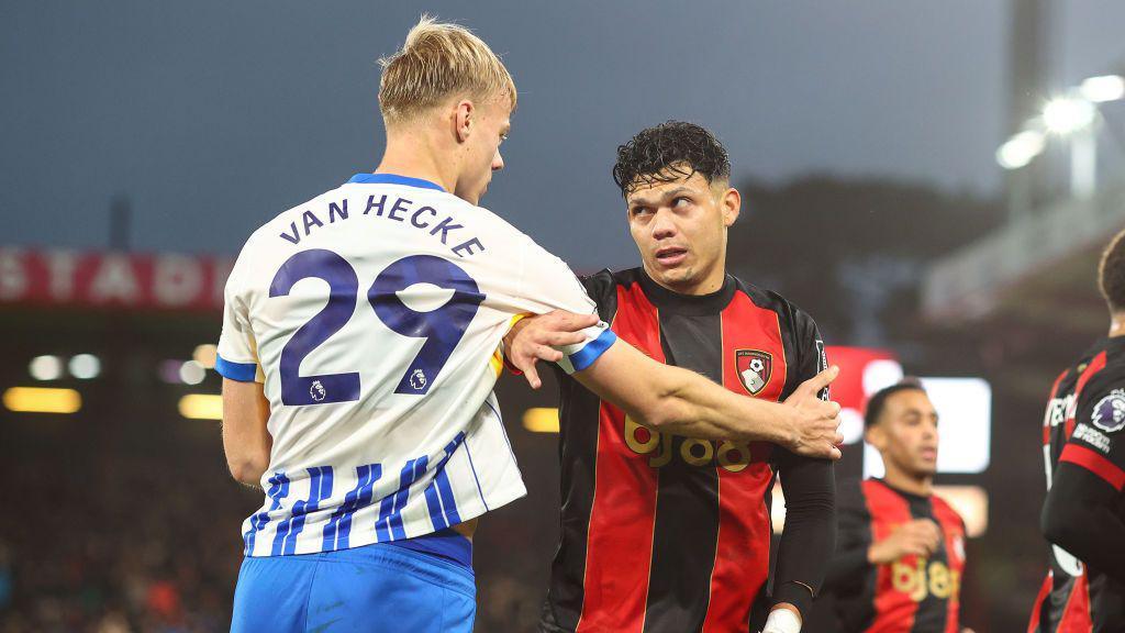 Evanilson of Bournemouth keeps Jan Paul van Hecke of Brighton & Hove Albion