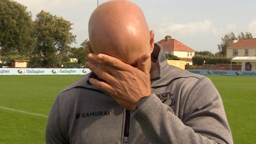 Jersey director of rugby Harvey Biljon wipes away a tear during an interview