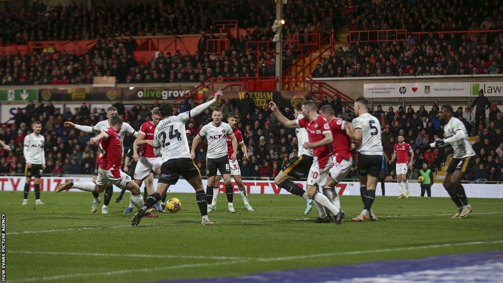 James Jones scores against Newport County at the Racecourse