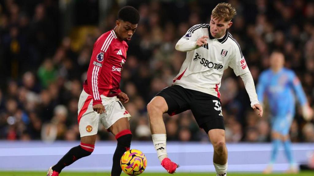 Amad Diallo tussles with Emile Smith Rowe