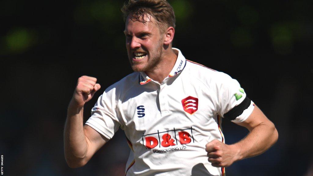 Jamie Porter celebrates taking a wicket for Essex against Middlesex