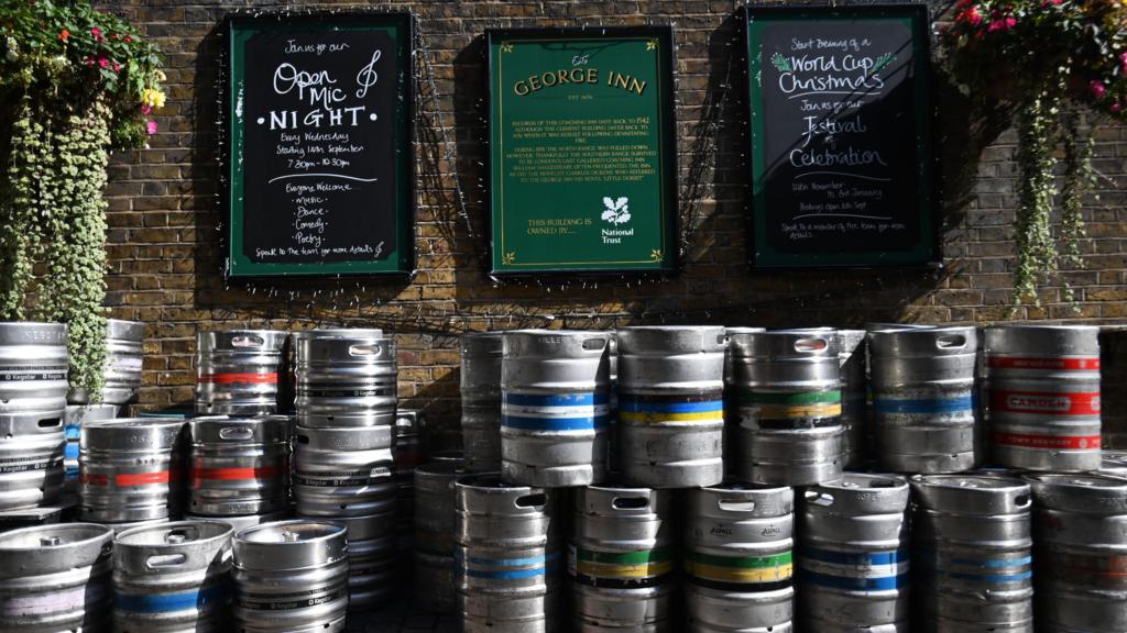 Beer and ale kegs outside a pub in London (file photo from 2022)