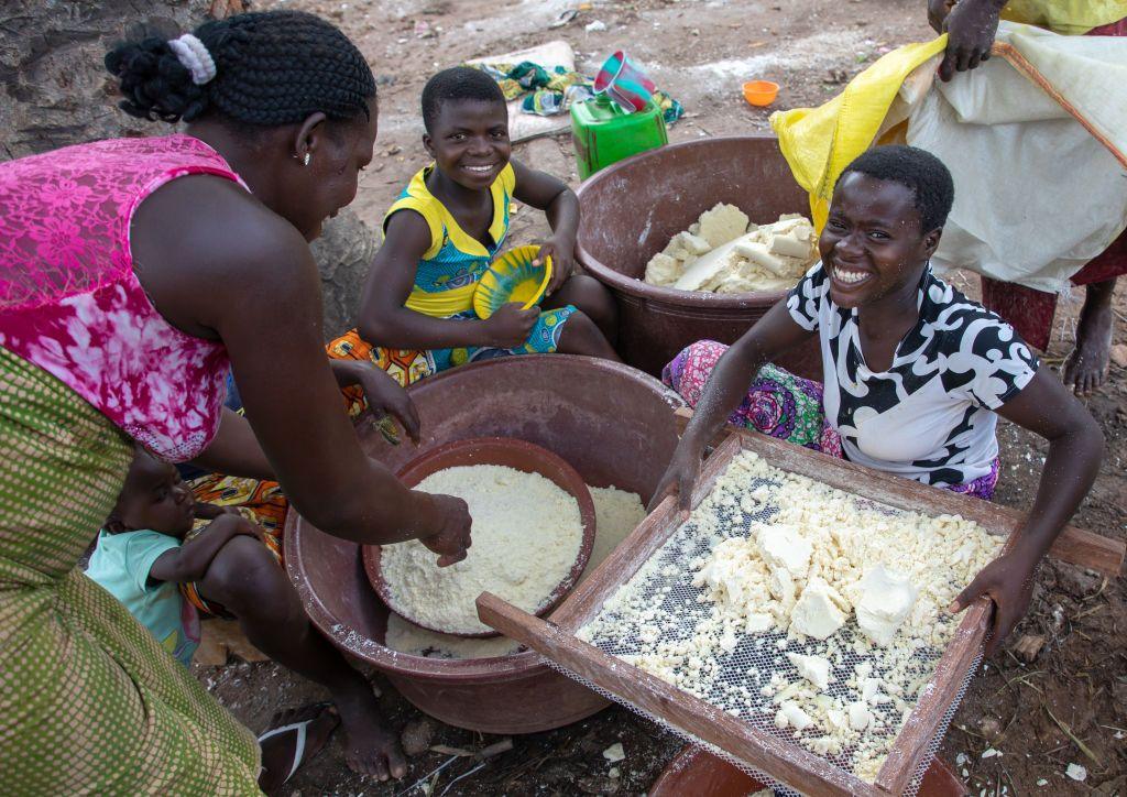 Three women making attiéké in Ivory Coast