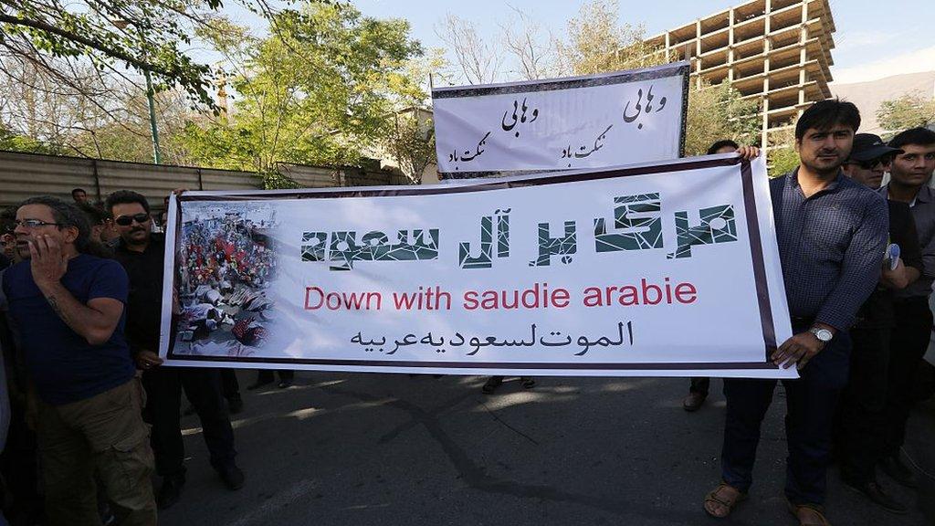 Iranian protesters hold a banner during a demonstration against Saudi Arabia outside the Saudi embassy in Tehran on 27 September 2015