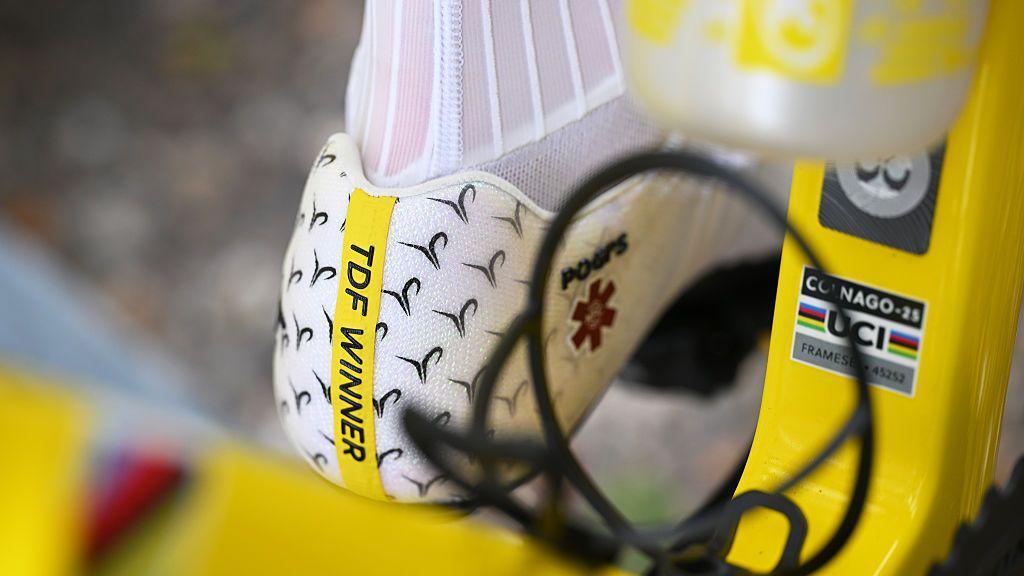 A close-up of Tadej Pogacar's cycling shoes