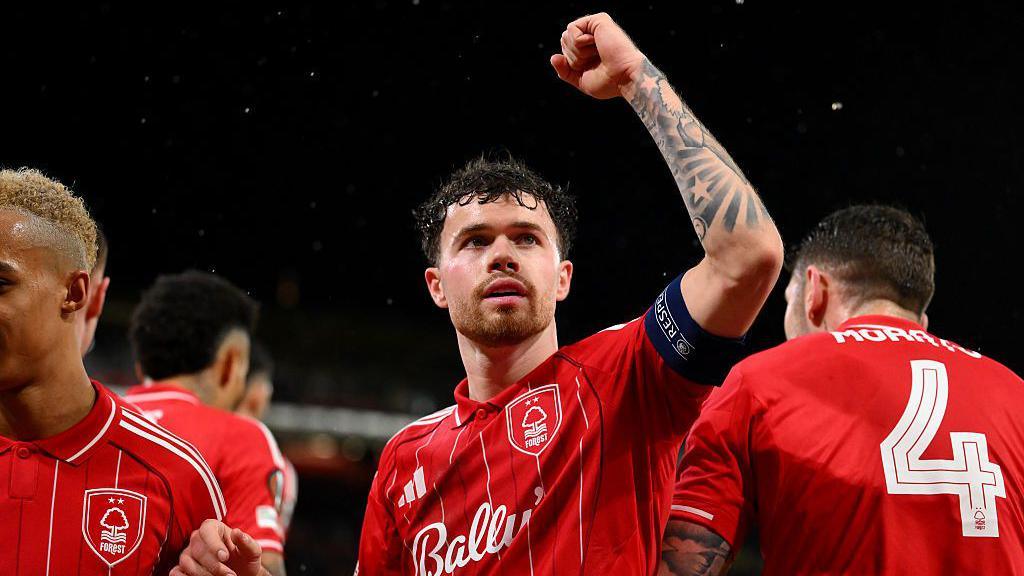 Neco Williams with his fist in the air