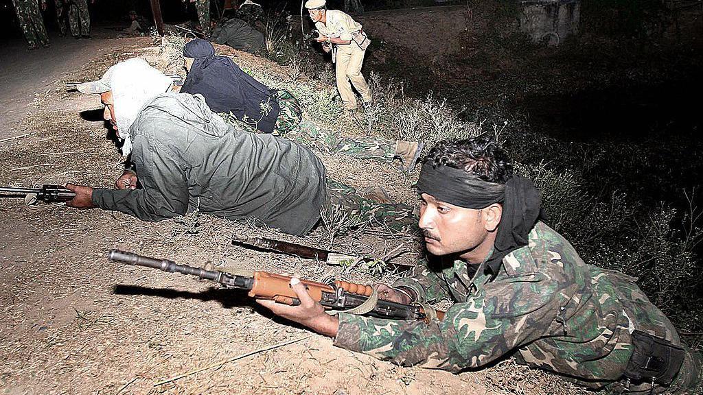 : An Indian soldier take positions near a jail in Jehanabad, some 45 kilometres south of Patna in the eastern Indian state of Bihar, 13 November 2005.