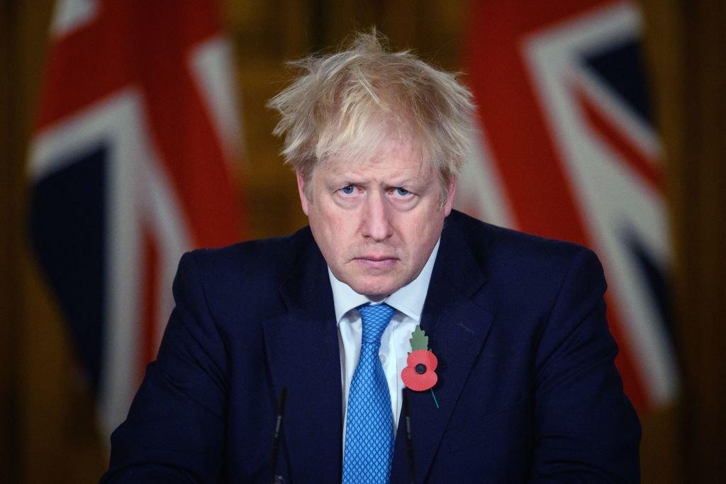 Mr Johnson at a press briefing