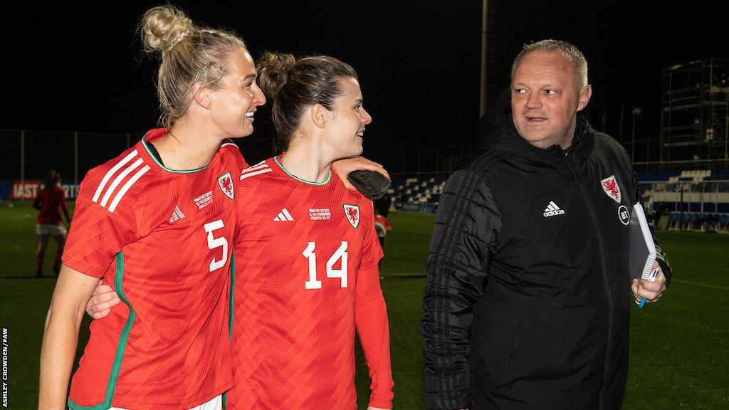 Rhiannon Roberts and Hayley Ladd speak to Jon Grey after Wales' goalless draw with Iceland at the Pinatar Cup