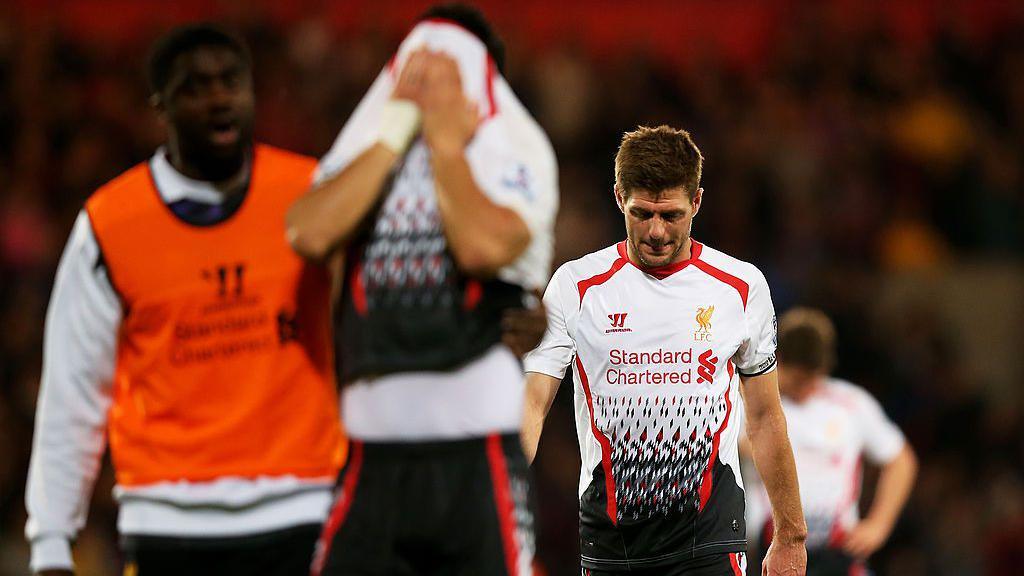 Liverpool players look dejected after blowing a three-goal lead at Crystal Palace in 2014
