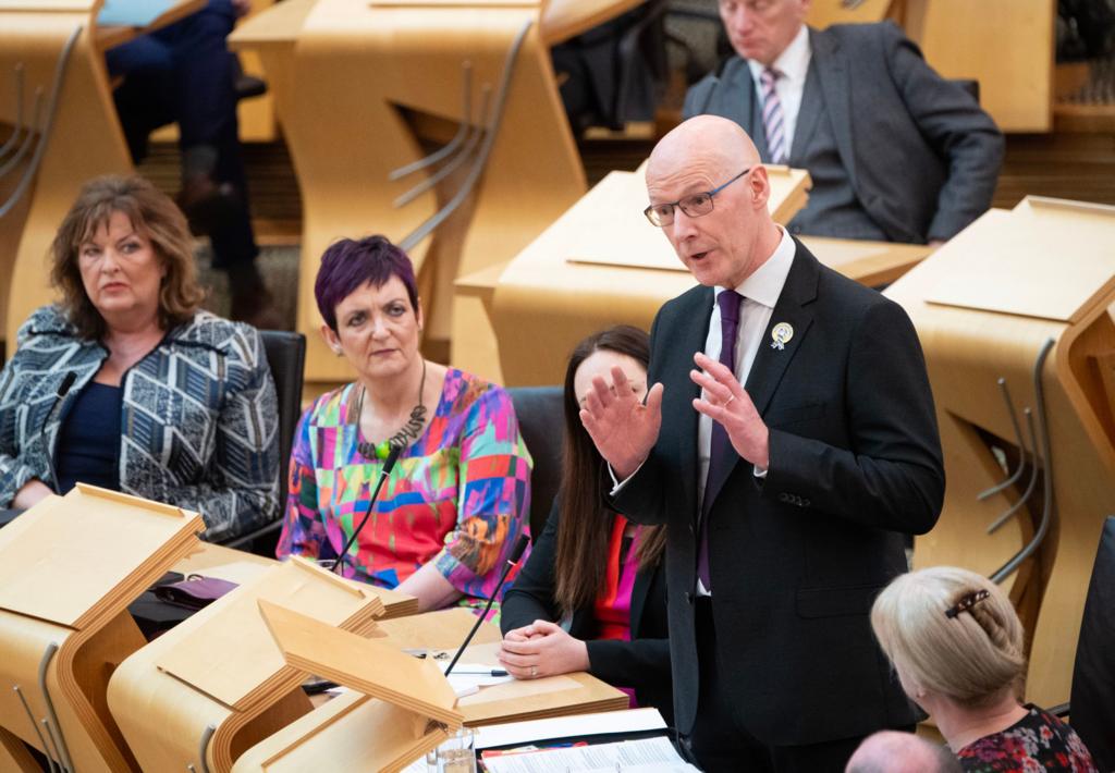 John Swinney faces questions from opposition party leaders during first minister's questions