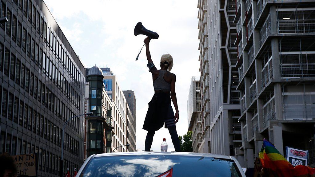 Imarn Ayton with a megaphone