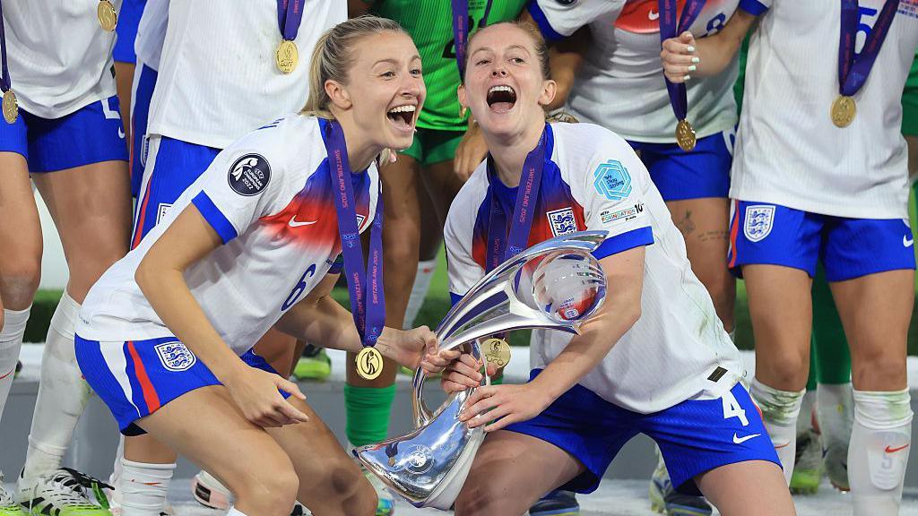 Leah Williamson and Keira Walsh lift Euro 2025 trophy