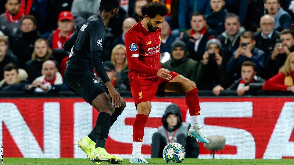 RB Salzburg's Patson Daka (left) up against Liverpool's Mohamed Salah