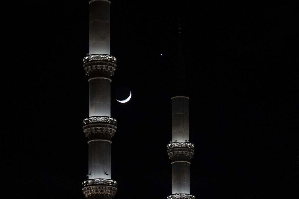 In Turkey's capital Ankara the moon and Venus are seen together alongside the Kocatepe Mosque