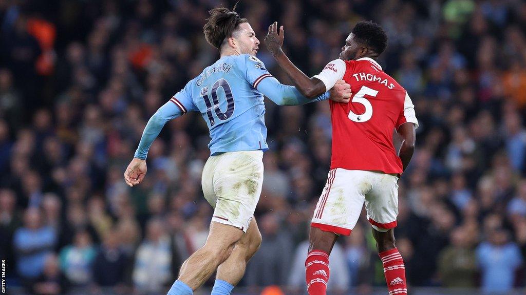 Jack Grealish and Thomas Partey clash