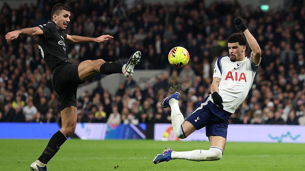 Dominic Solanke scoring a goal with a scorpion kick for Tottenham against Manchester City