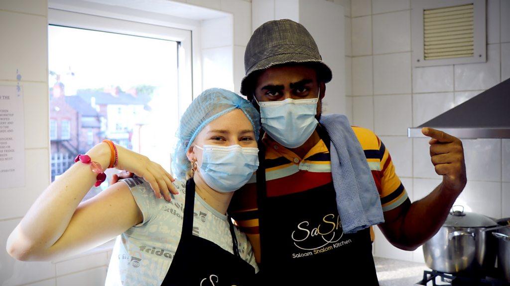 Two volunteers at Salaam Shalom Kitchen