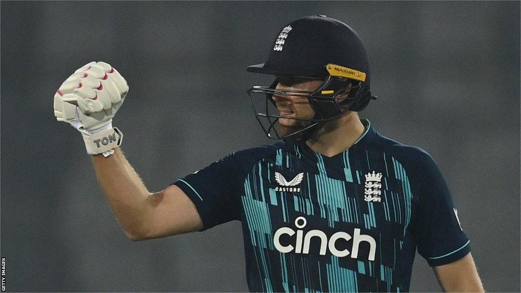 Dawid Malan celebrates reaching his century against Bangladesh