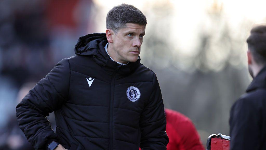 Alex Revell on the touchline