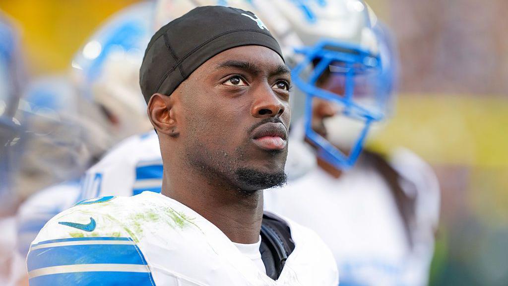 Terrion Arnold of the Detroit Lions looks on from the sideline during an NFL game against the Green Bay Packers in September 2025
