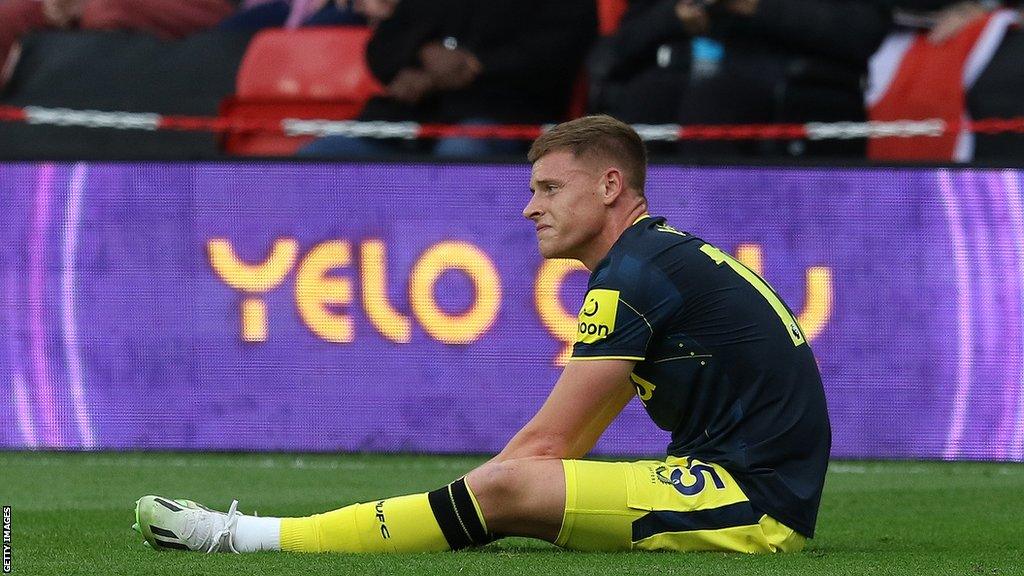 Harvey Barnes on the floor awaiting treatment