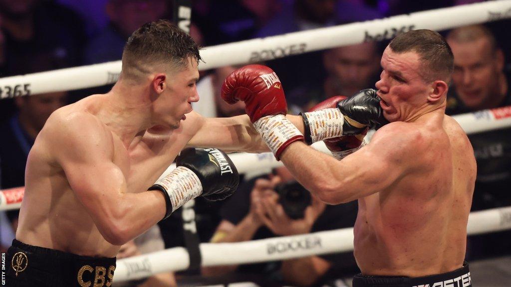 Chris Billam Smith and Mateusz Masternak exchanging blows in WBO world cruiserweight championship fight