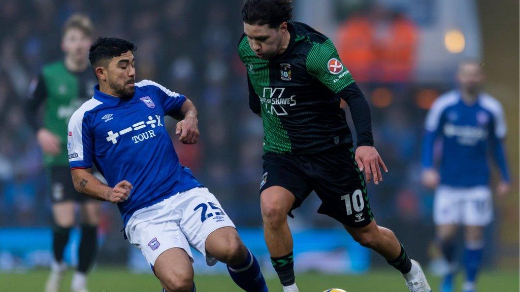 Coventry's Callum O'Hare is challenged by Ipswich Town's Massimo Luongo