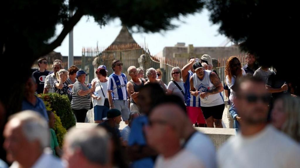 People wait to pay their respect during the wake for Liverpool's Portuguese soccer player Diogo Jota and his brother Andre Silva