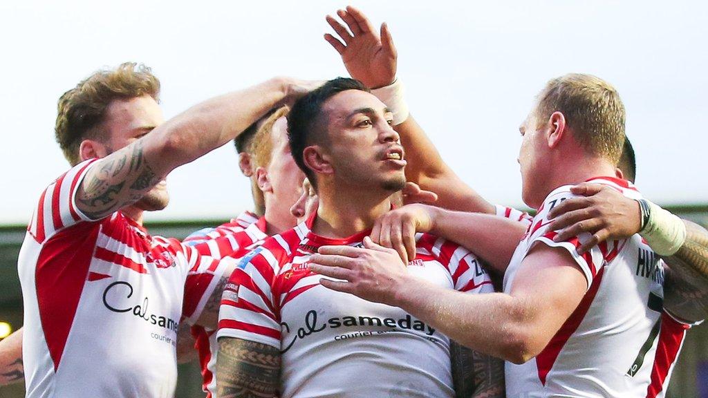 Harrison Hansen celebrates with his team-mates after scoring a try for Leigh against Salford