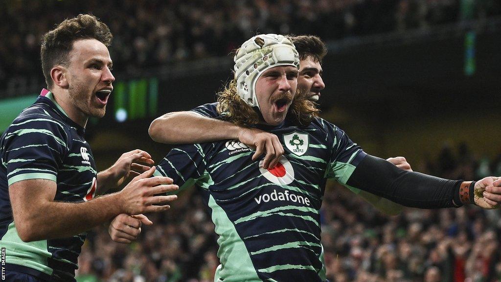 Mack Hansen celebrates his try against South Africa