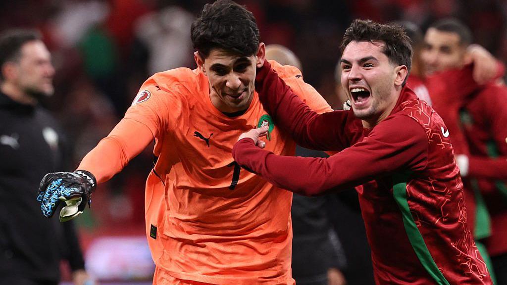 Brahim Díaz celebrates getting to the Afcon final with Morocco goalkeeper Yassine Bounou