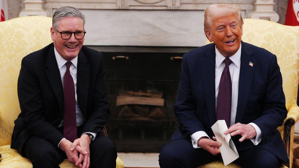 Image shows UK Prime Minister Sir Keir Starmer sitting next to US President Donald Trump at the White House