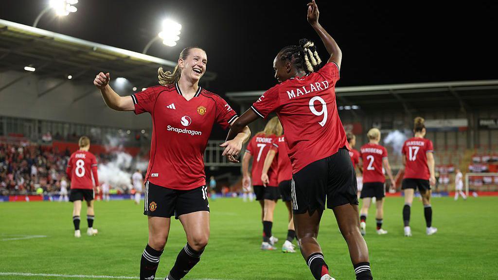 Elisabeth Terland celebrating with Melvine Malard