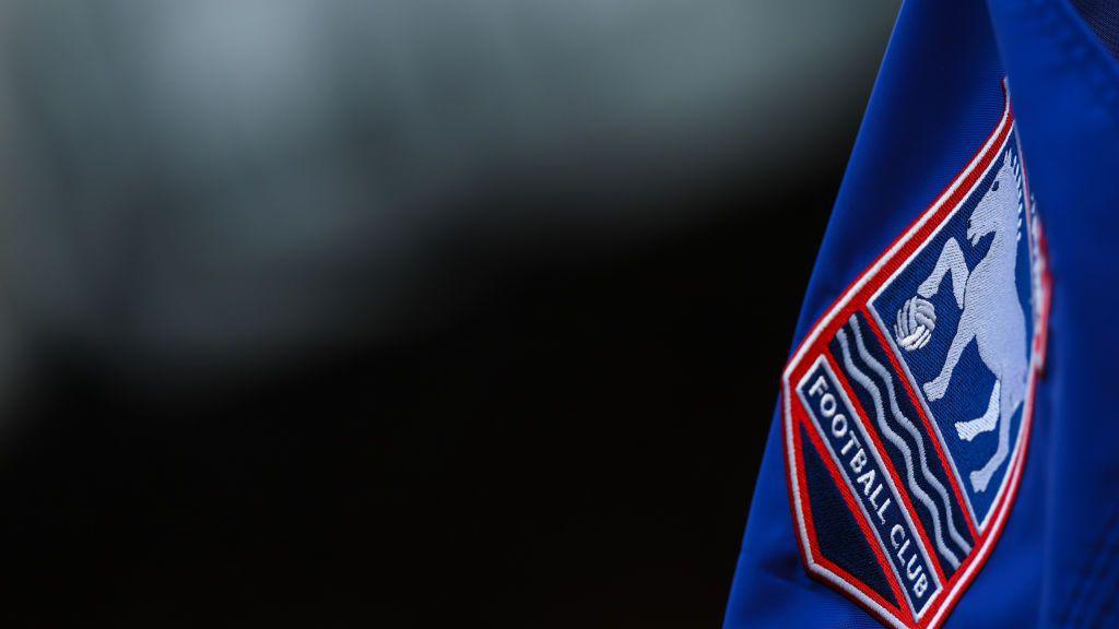 Ipswich Town's club badge on a corner flag close-up