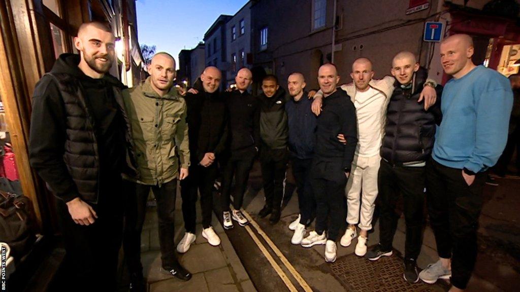 Bristol Rovers players after having their heads shaved