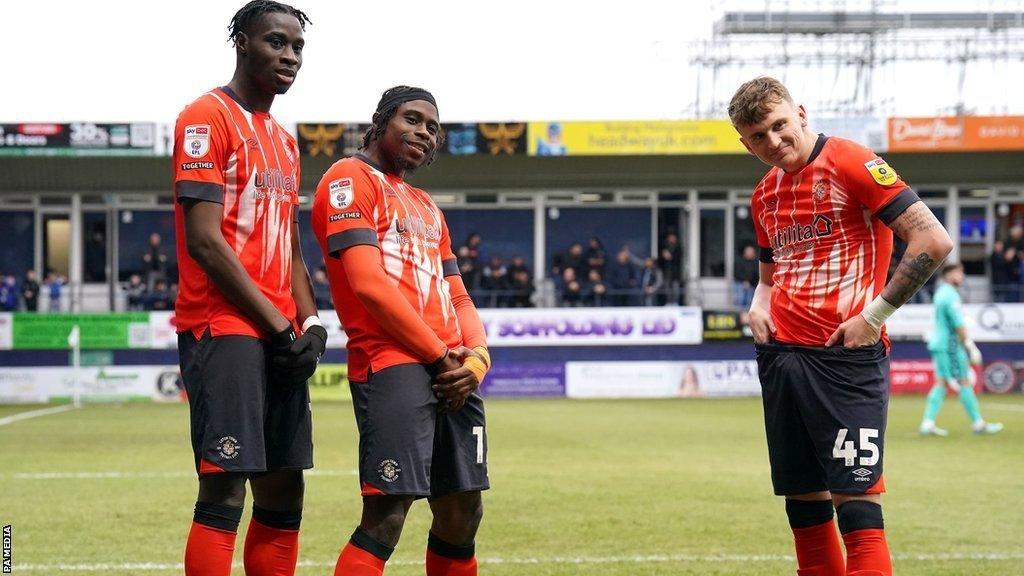 Luton team-mates Elijah Adebayo (left) and Alfie Doughty (right) posed for a nice celebration picture after Pelly Ruddock-Mpanzu's first goal in almost 18 months