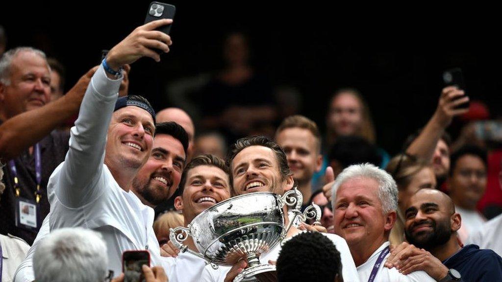 Neal Skupski and Wesley Koolhof celebrate with fans