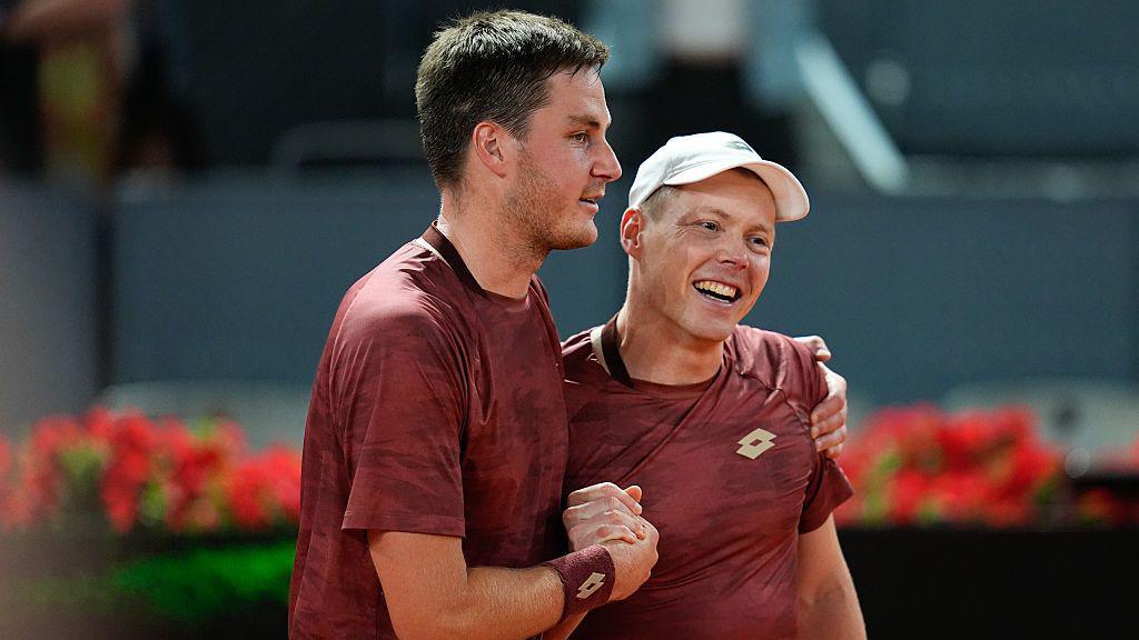 Harri Heliovaara of Finland and Henry Patten of Great Britain celebrate